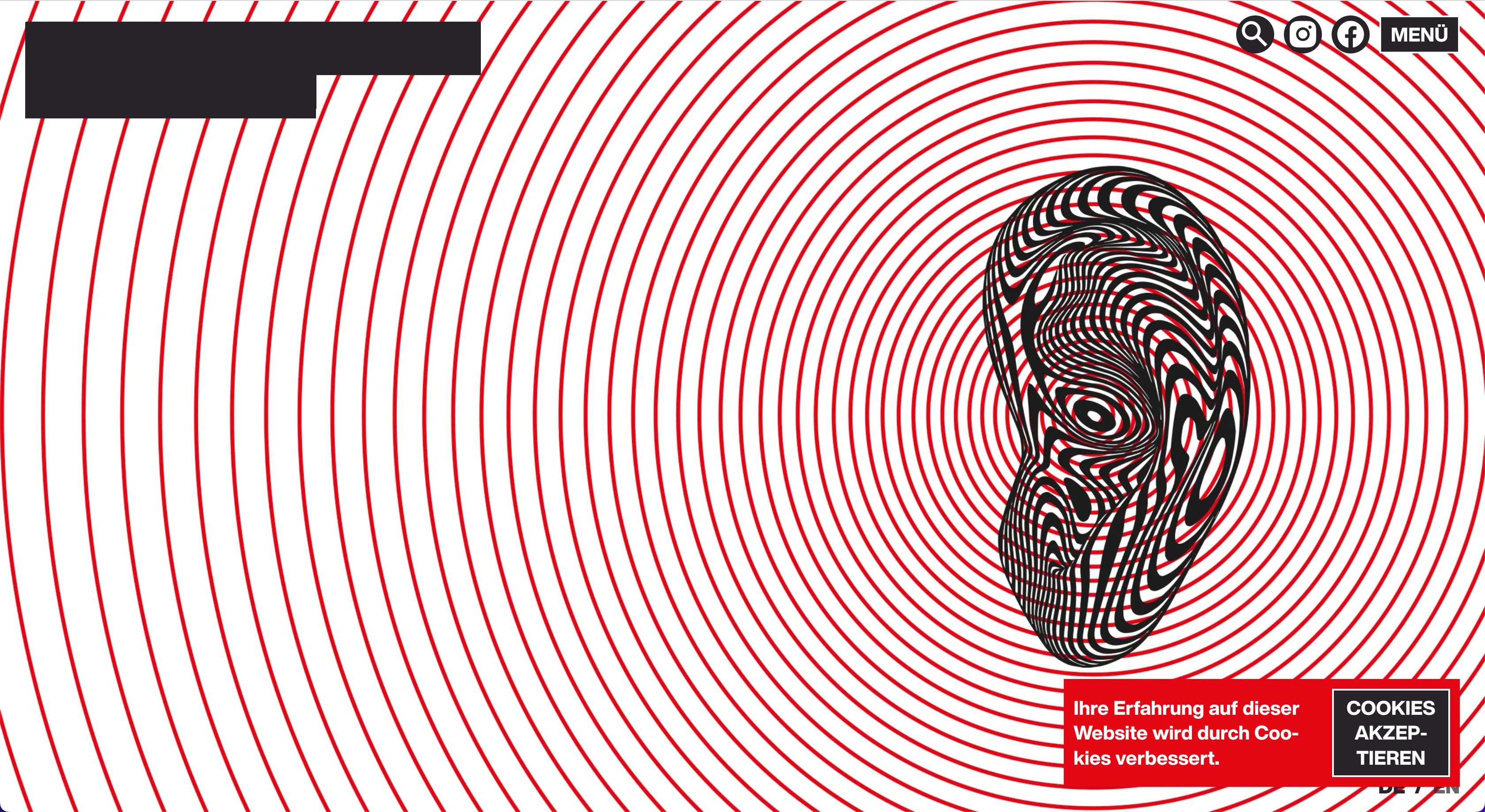 A screenshot of the selected websites homepage displaying a full-screen image showing a black-and-white illustration of a human ear surrounded by red circles visualysing sound waves. Additionally, in the top right corner of the screenshot are a menu icon, a search icon and social media icons. In the bottom right corner is a cookie banner reading German text: 'Ihre Erfahrung wird auf dieser Website durch Cookies verbessert - cookies akzeptieren'. This translates to 'your experience on this website will be improved through cookies - accept cookies'.